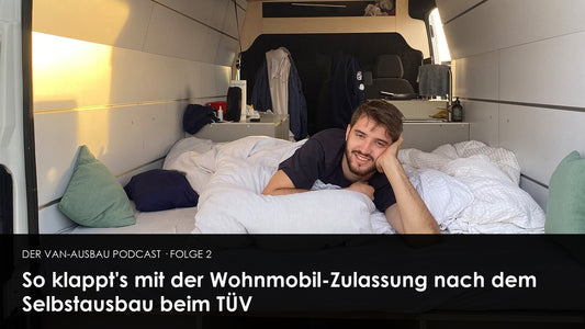 Fertig ausgebautes Bett im Kastenwagen, bereit für die Wohnmobil-Zulassung